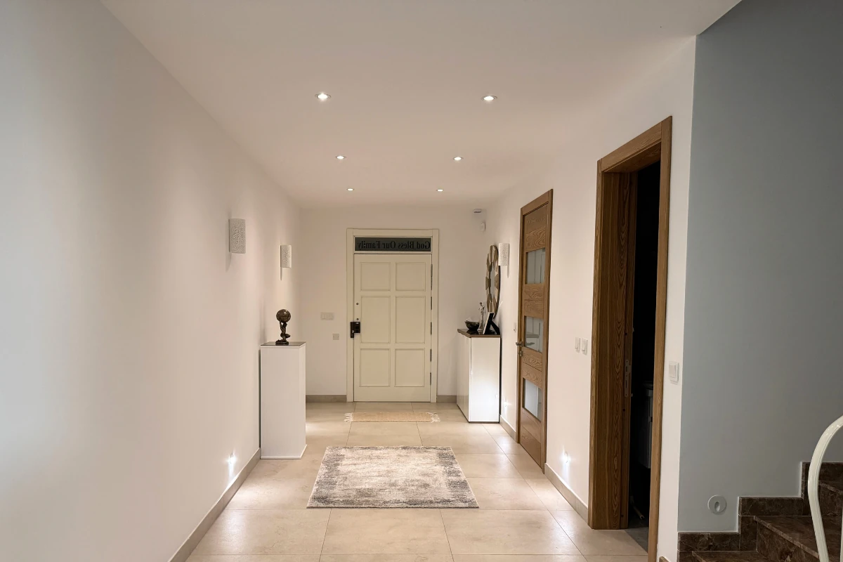 Interior hallway in Malta with freshly painted white walls and smooth finish